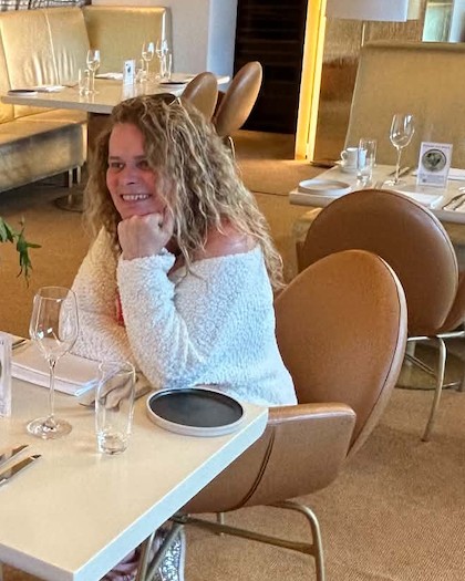 Jo Cox, Facebook and Instagram advertising specialist and founder of Toodlepip Media, smiling at a restaurant table